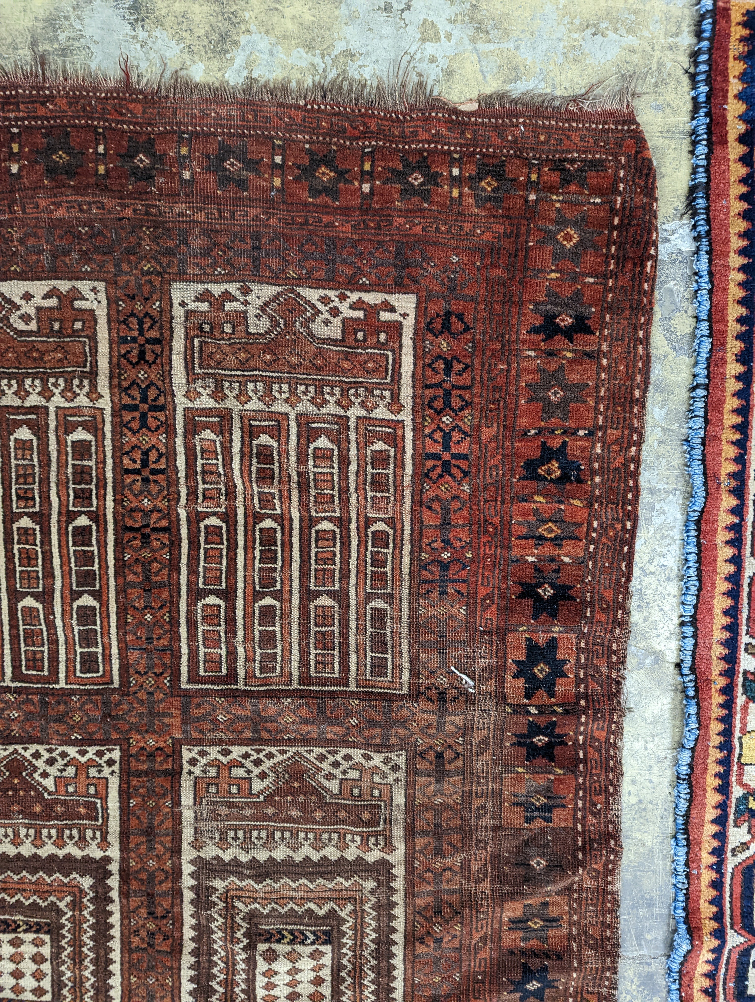 An Afghan red ground prayer rug, 166 x 120cm